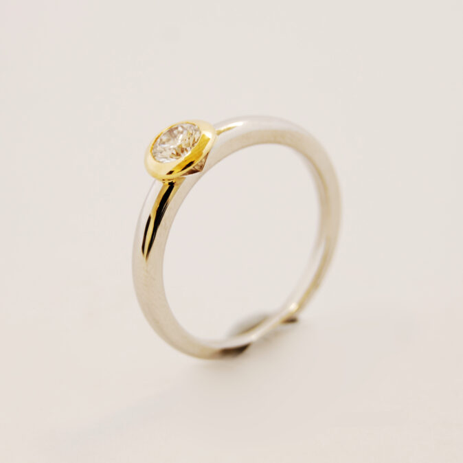 Modern Platinum and Yellow Gold Diamond ring